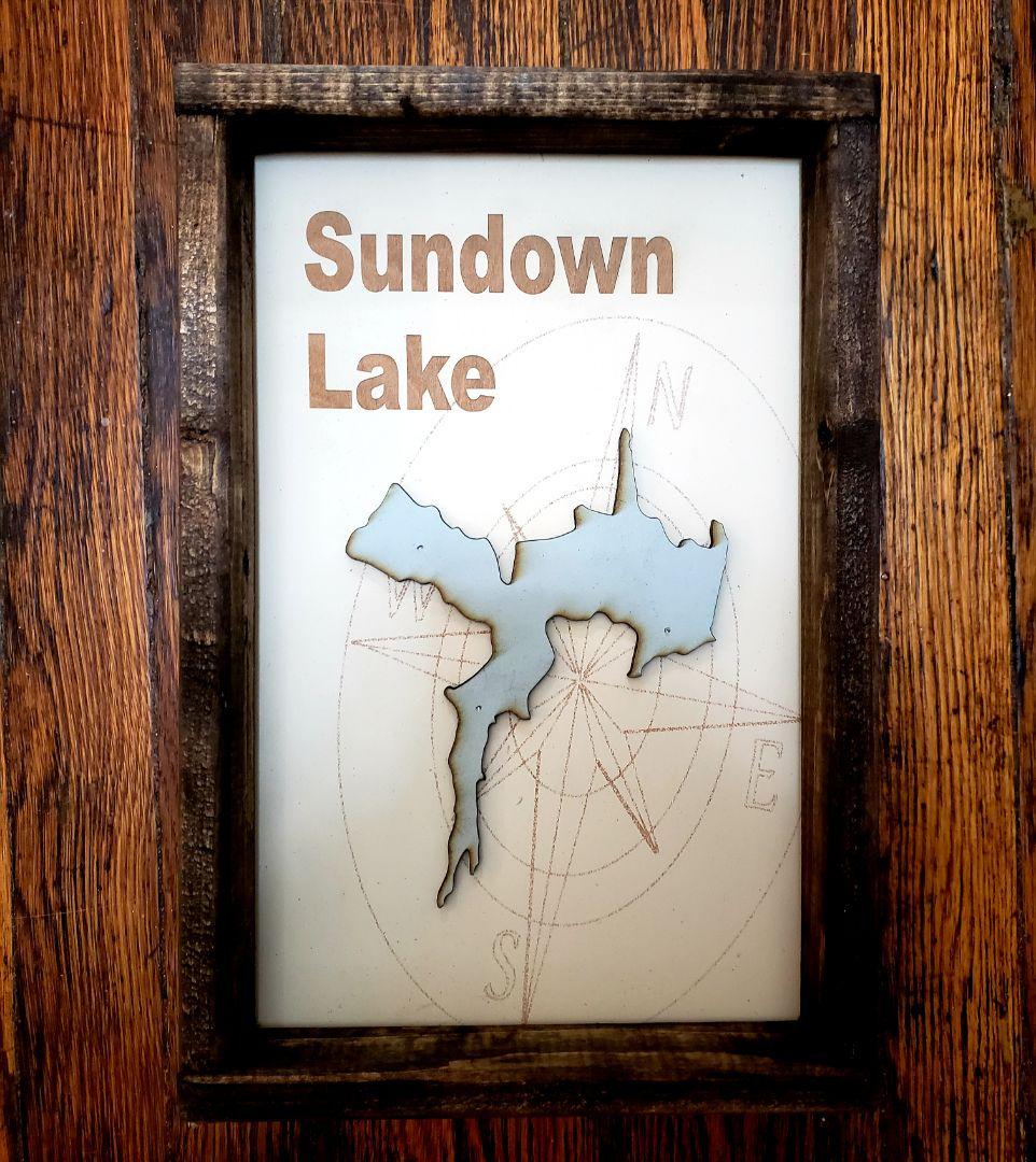 Lake Sign with Compass Background